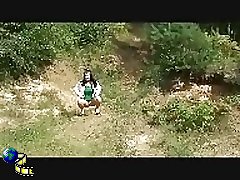 Girl on high heels gets busted pissing in forest Part 1
